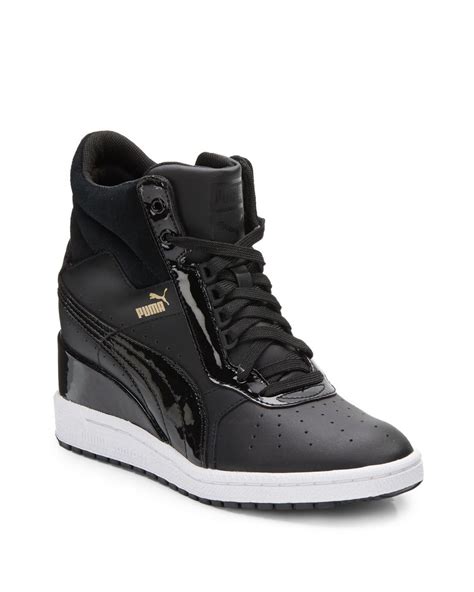 high top wedge puma sneakers.